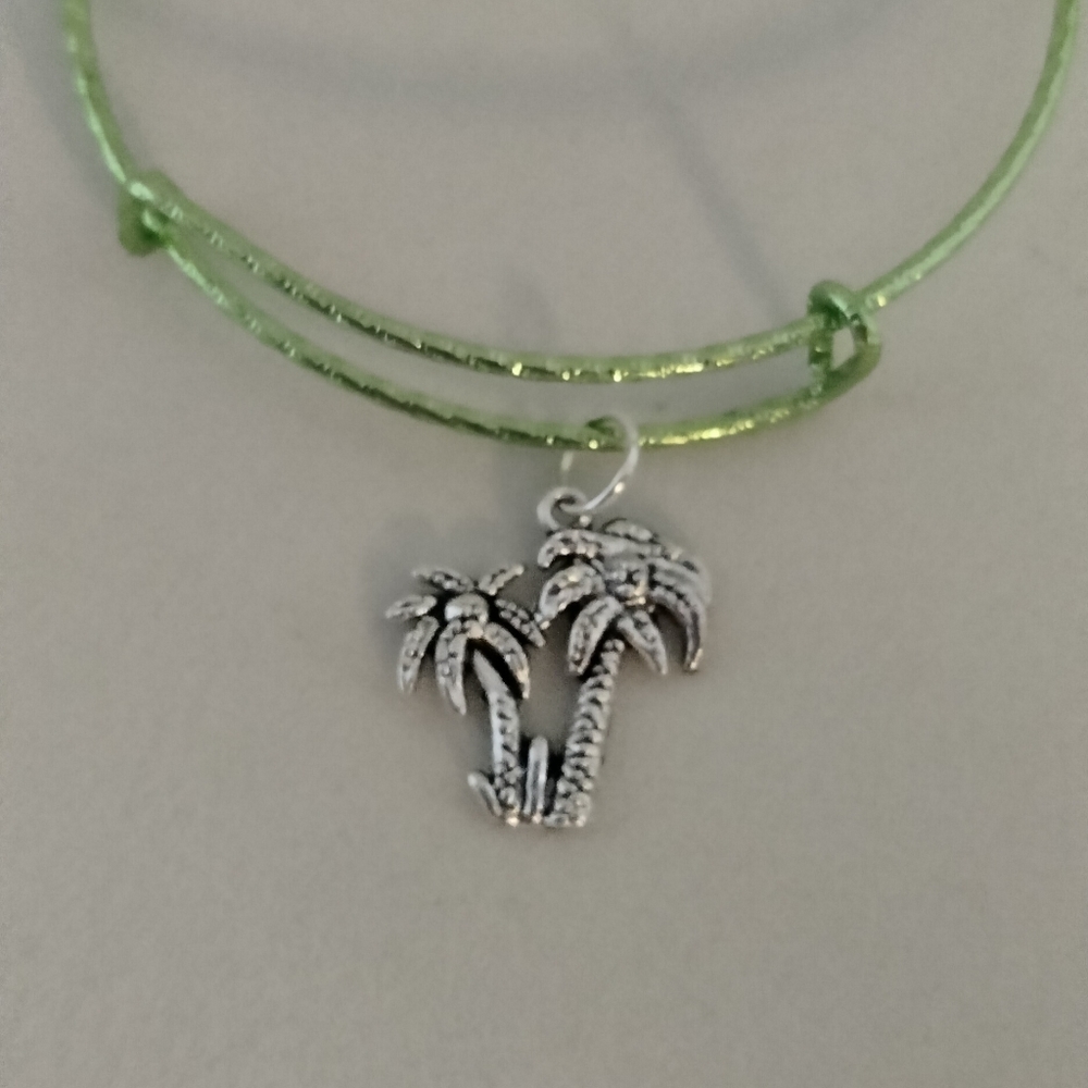 Palm trees on like a lime green bracelet